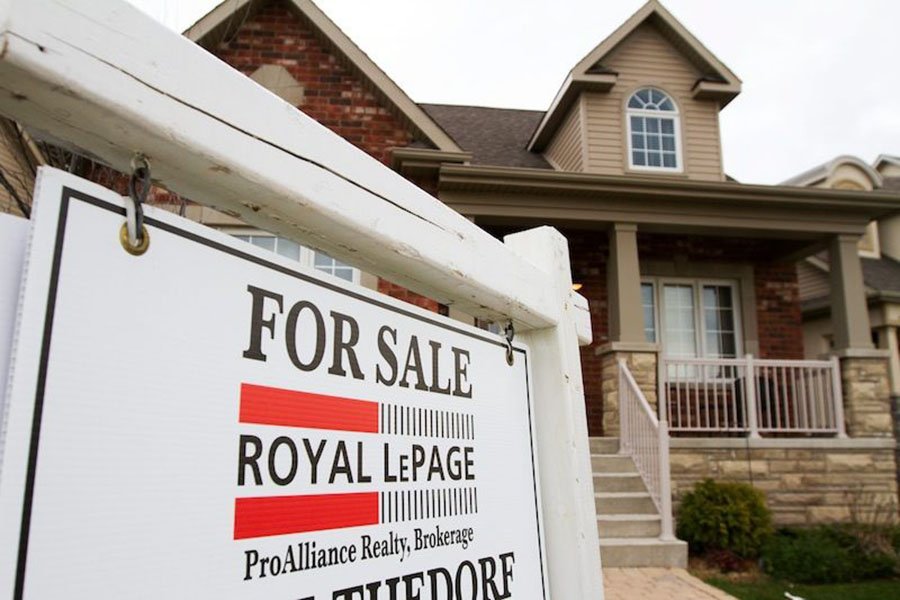 Canadian home sales rebound from 7-year low, but prices still flat