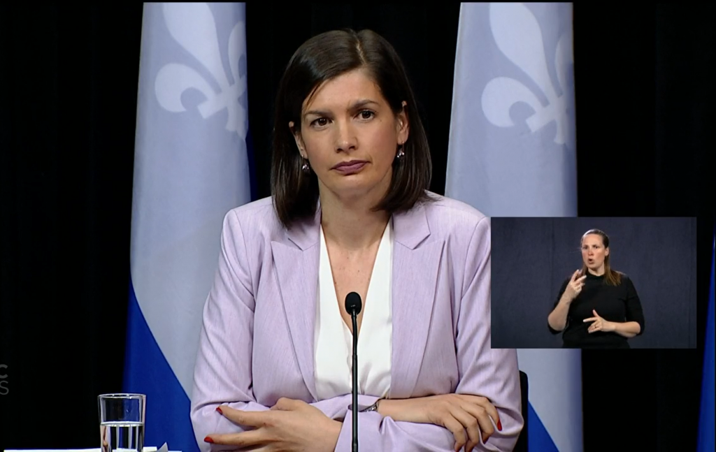 Quebec Deputy Premier Genevieve Guilbault listens to a reporter asking a question during coronavirus (COVID-19) emergency press briefing.